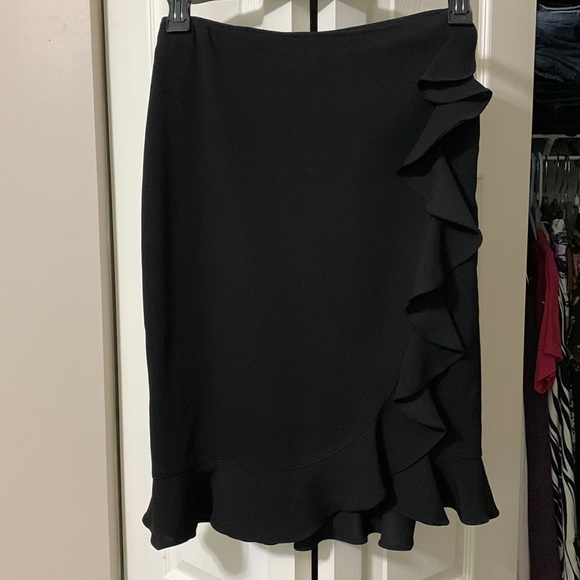 Drama Dresses & Skirts - Black knit Cute ruffled wrap skirt w side zipper sz2
